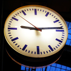 Fototapeta na wymiar illuminated station clock