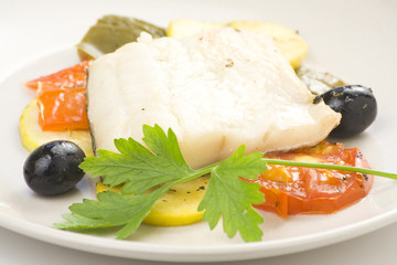 fillet of cod baked tomatoes zucchini black olives