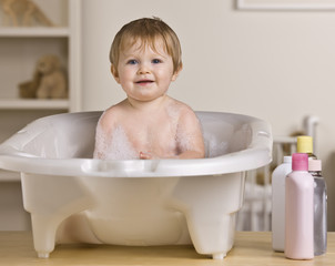 Naklejka premium Happy Baby in Bathtub