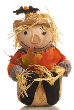 autumn basket with halloween scarecrow