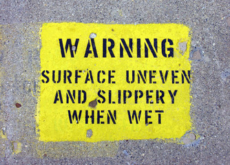 Fototapeta premium slippery surface warning stencil on pier