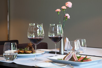 Served dinner in modern restaurant