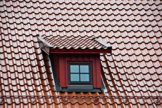 Window on mansard with tilled roof