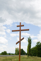 Fototapeta na wymiar orthodox cross on near road