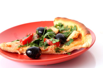 Pizza with olives on the plate