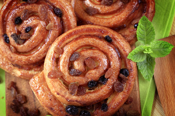 Sweet pastry rolls with raisins
