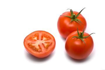 Fresh tomatoes. Macro studio isolated on white.