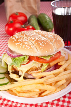 cheeseburger, french fries and cola