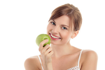 Portrait of young woman with green apple