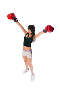 Fit girl with boxing gloves
