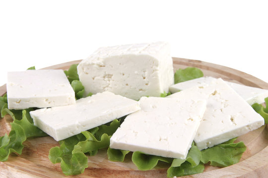 feta cheese on wooden plate