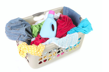 Laundry Basket Full of Dirty Clothes and Softener