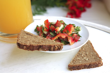 tomato salad and orange juice