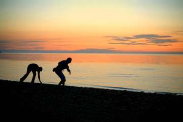 Couple are skipping stones