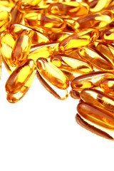 Omega 3 fish oil capsules over white background
