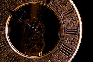 Clock isolated on black background.
