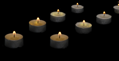 Obraz na płótnie Canvas Candles in darkness