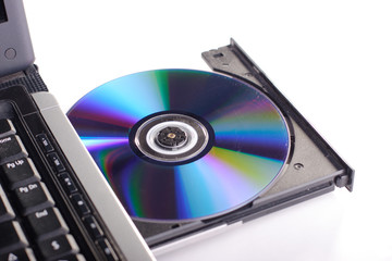 DVD ROM on a laptop opened to show disc.