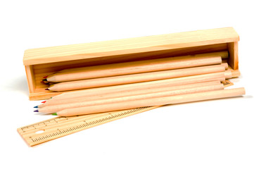 pencils in an old wooden school box