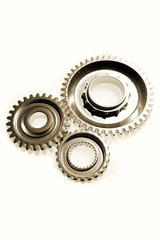 Three gears over white background