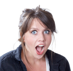 Close-up of shock and surprise expression on young woman