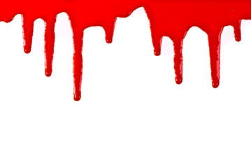 Red paint pouring on white background