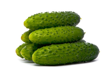 Fresh cucumbers on studio white