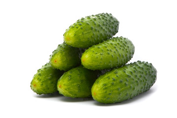 Fresh cucumbers on studio white