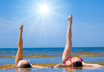 Active girls on a beach
