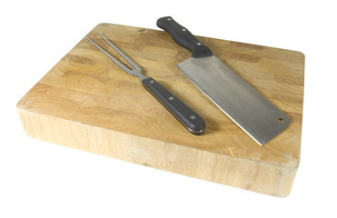 meat cleaver and fork on chopping board isolated on white