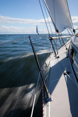 Fototapeta na wymiar Sailing with speed