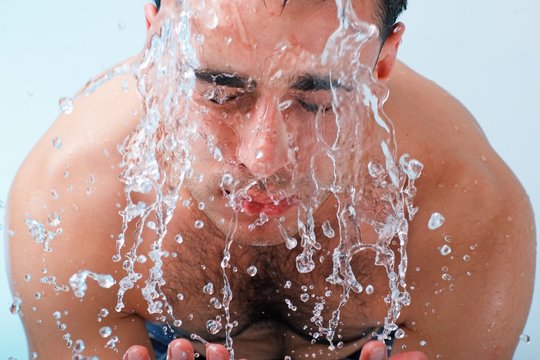 Man Washing Face