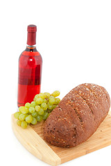 Brown bread wine and grapes
