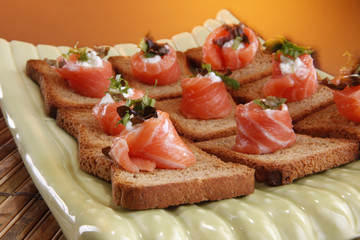 Smoked salmon on whole wheat bread crackers