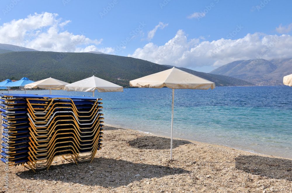 Wall mural landscape with  beach and parasols