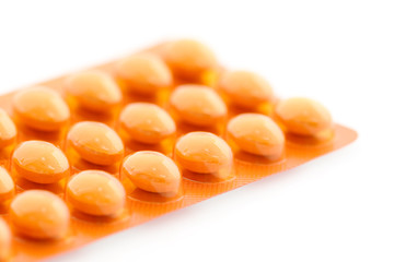 Plaquette de gélules oranges
