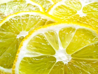 Foto op Plexiglas Sappige schijfjes citroen © Vidady