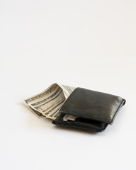 Wallet full of hundred dollar bills