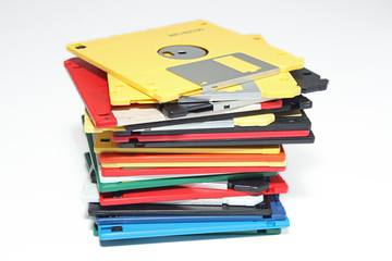 Many colored compute diskette isolated on white