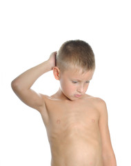 A young boy thinking hard about something.