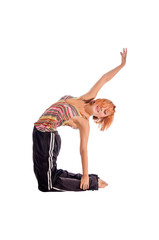 Red haired girl performing fitness exercises