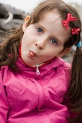 Girl showing her tongue