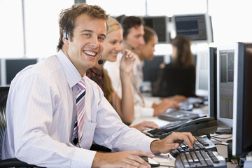 Stock Trader Smiling At Camera