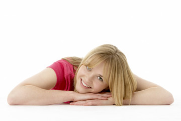 Fototapeta premium Studio Portrait Of Smiling Teenage Girl