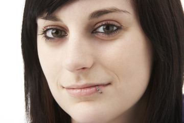 Obraz premium Studio Portrait Of Smiling Teenage Girl