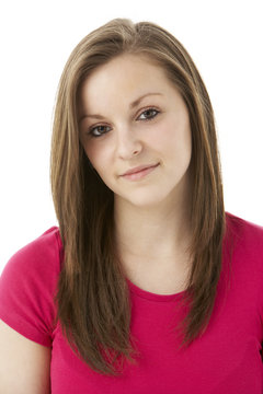 Studio Portrait Of Smiling Teenage Girl