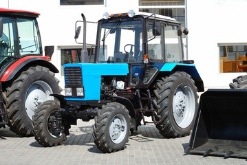 Obraz premium New tractor on a showcase