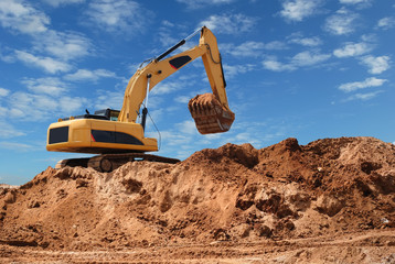 Excavator bulldozer in sandpit