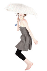 frau springt mit schirm
