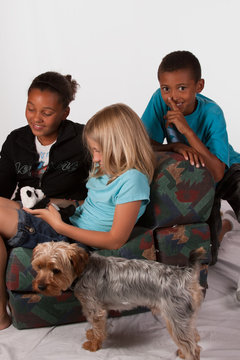 Boy trying to sneak up on sister and firend